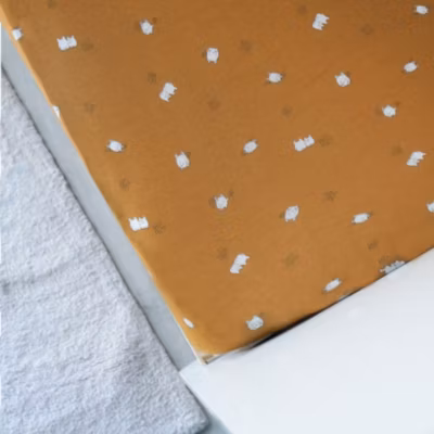 Drap housse en jersey de coton motif enfantin (70×140 cm – Bronze)